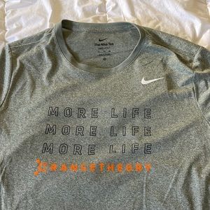 Orange Theory Fitness Nike WOMENS XL Dri-Fit shirt. Never been worn.